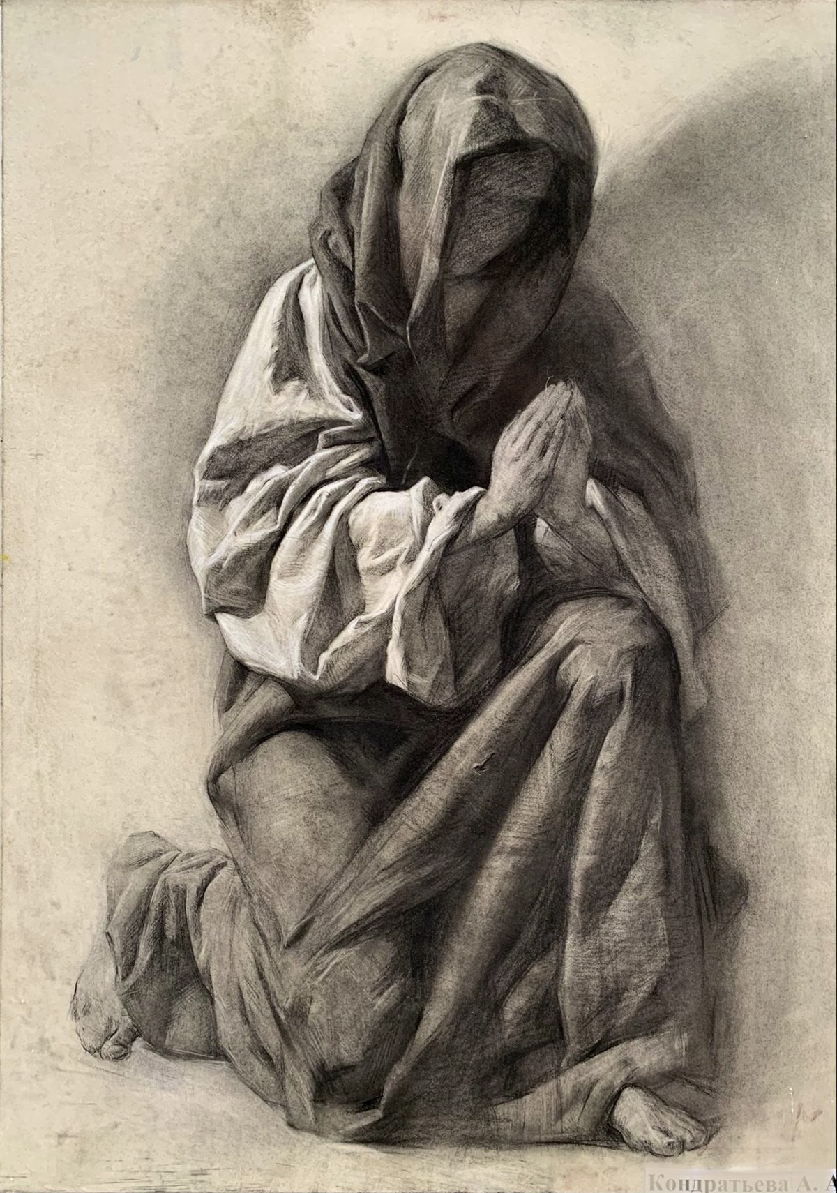 Charcoal drawing of a draped figure cradling a baby.