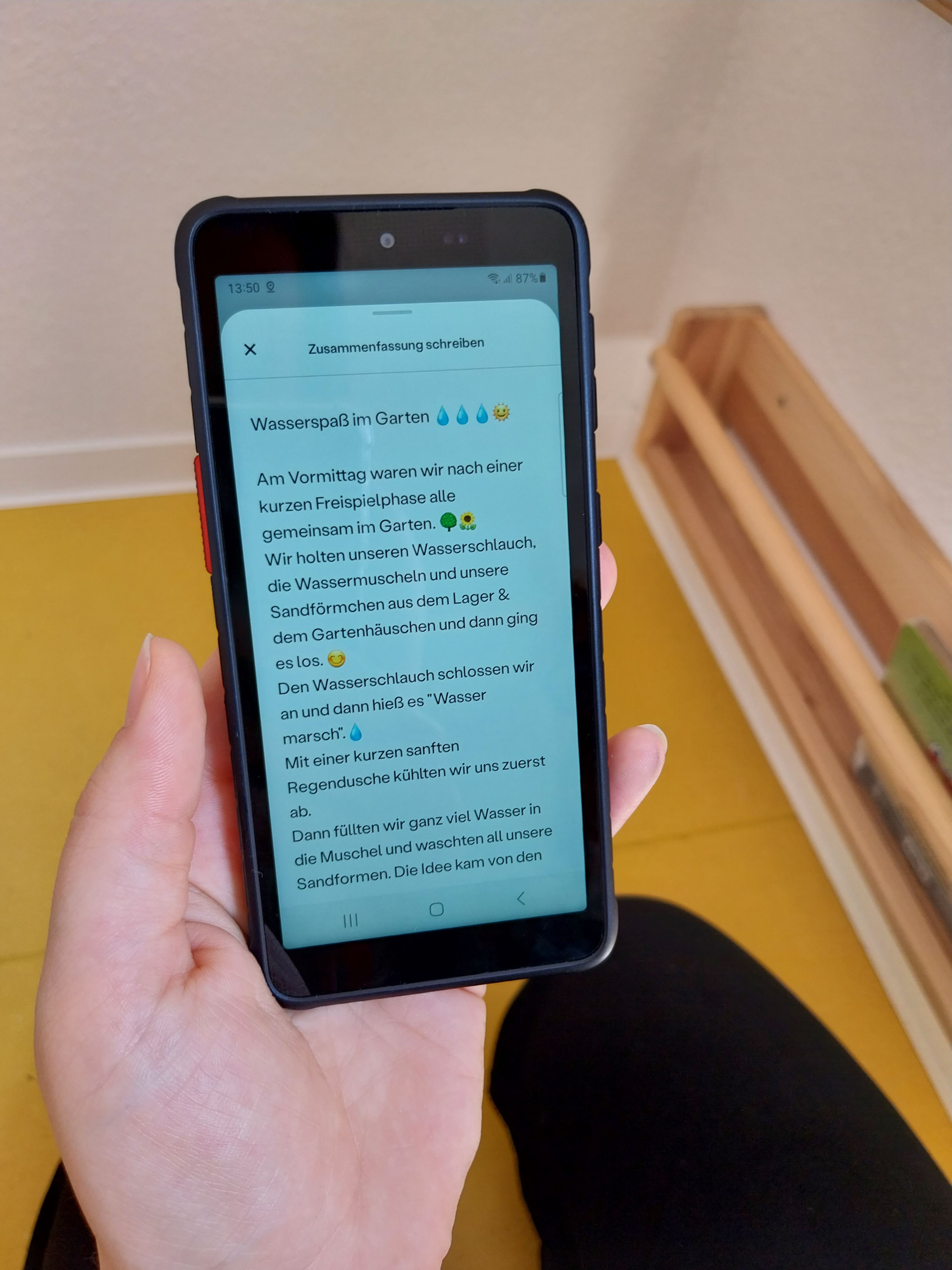a person is holding a cell phone with a daily summary