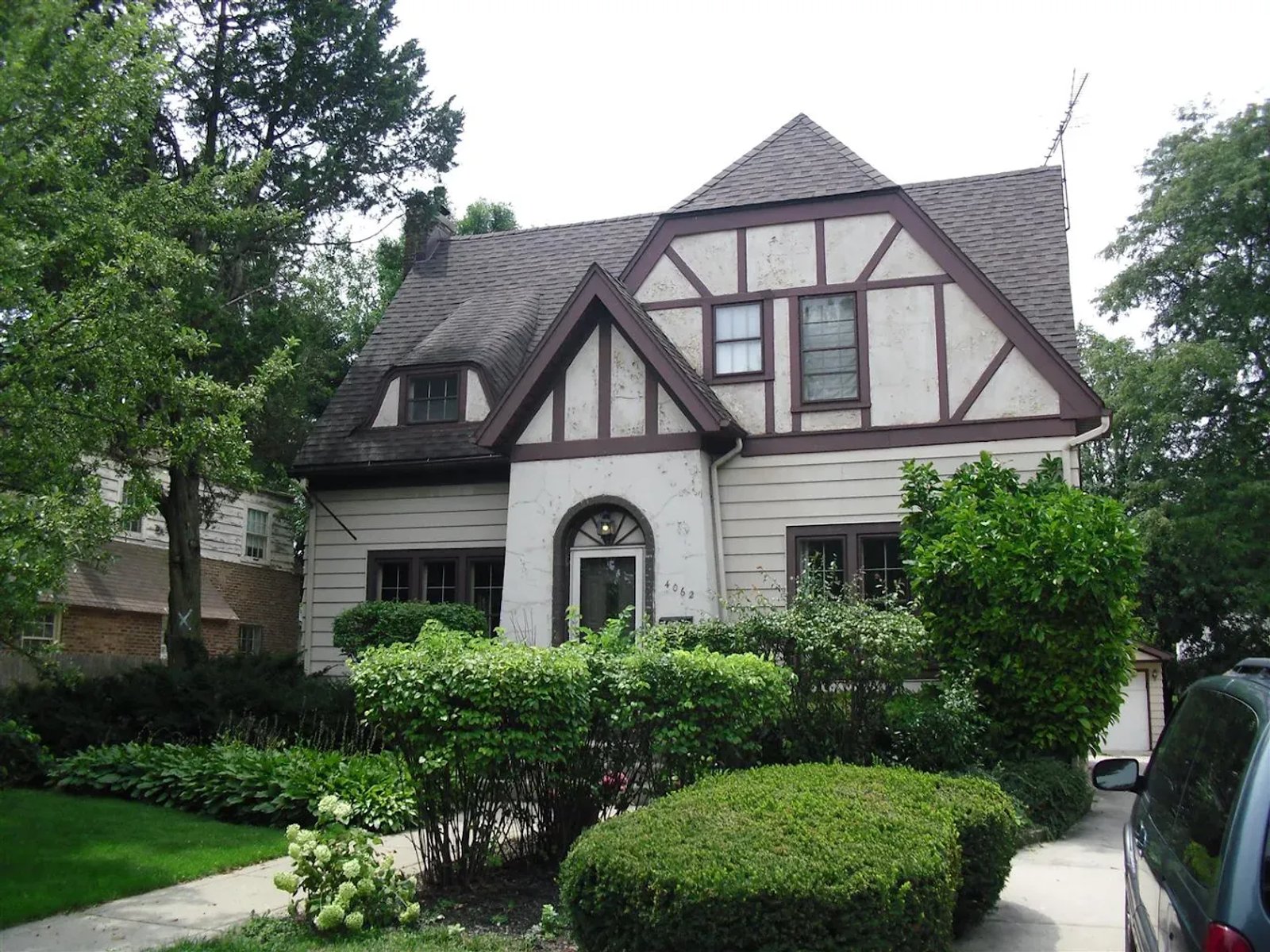 New replacement windows installed on a tudor style home in Elmhurst, Illinois by Durabuilt Home Improvements