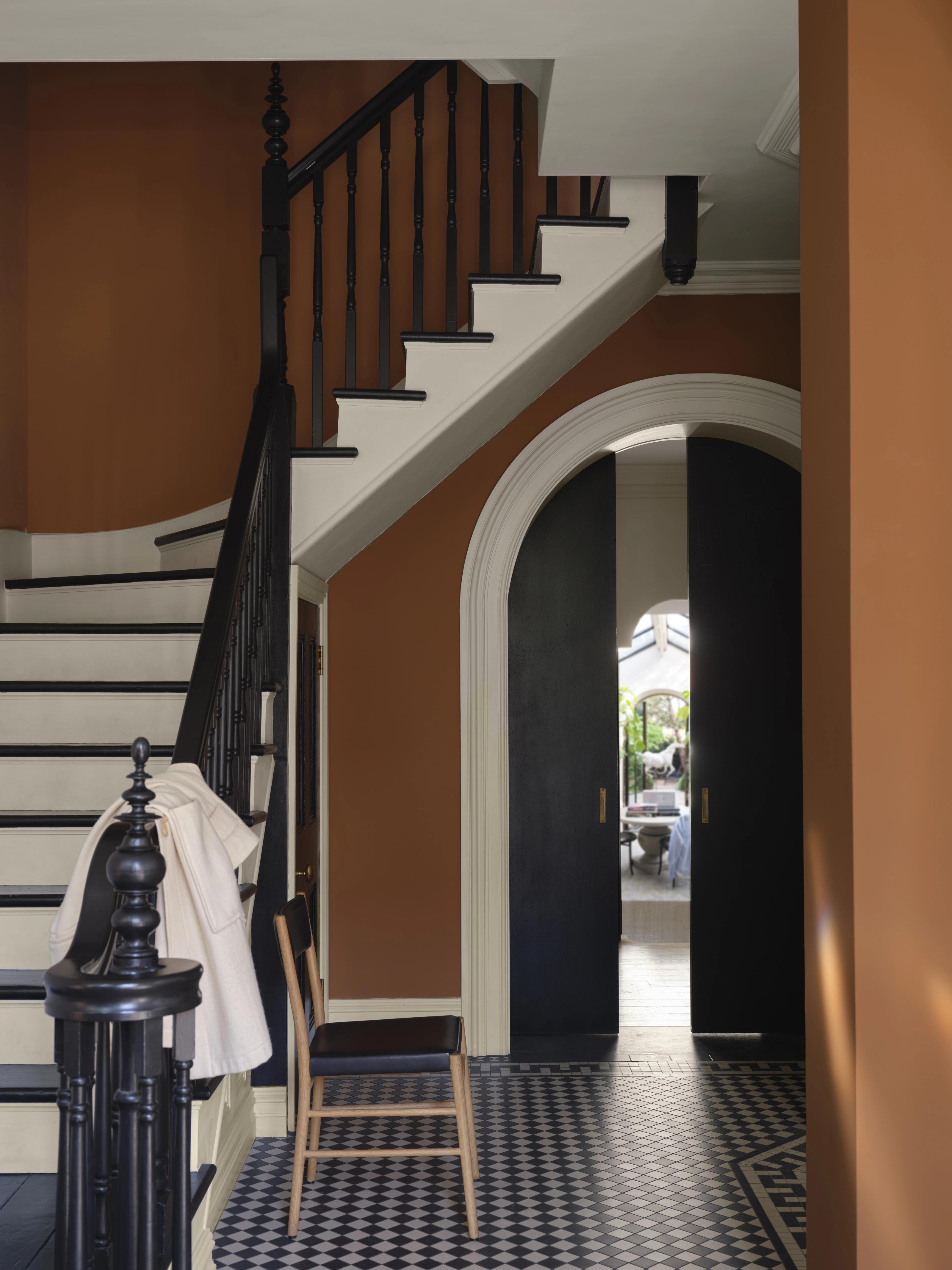 Farrow & Ball blue and mustard colours on walls of a house 