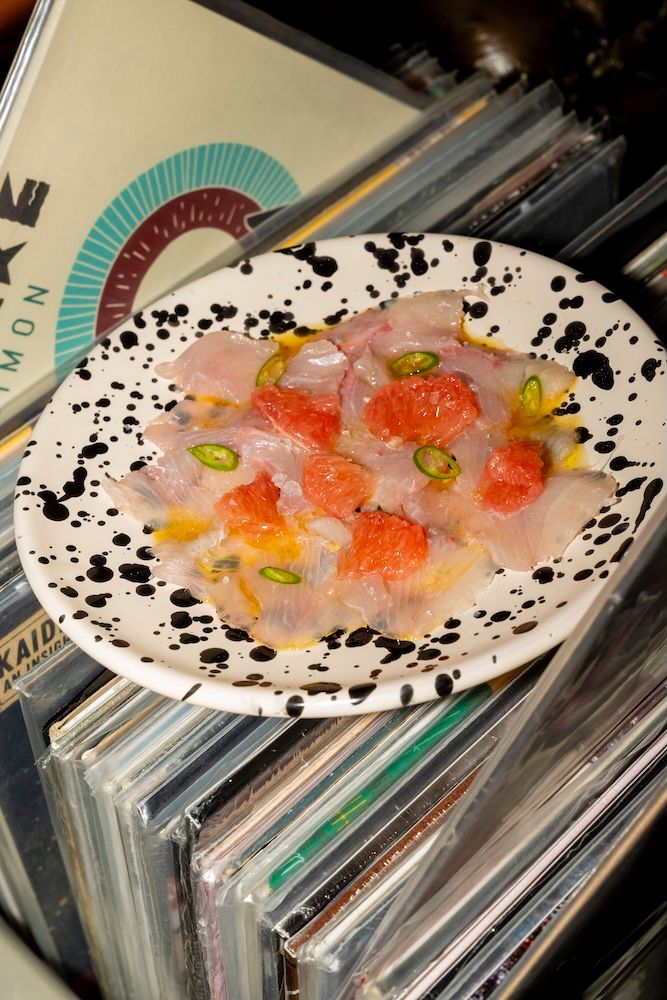 A plate of ceviche on records 