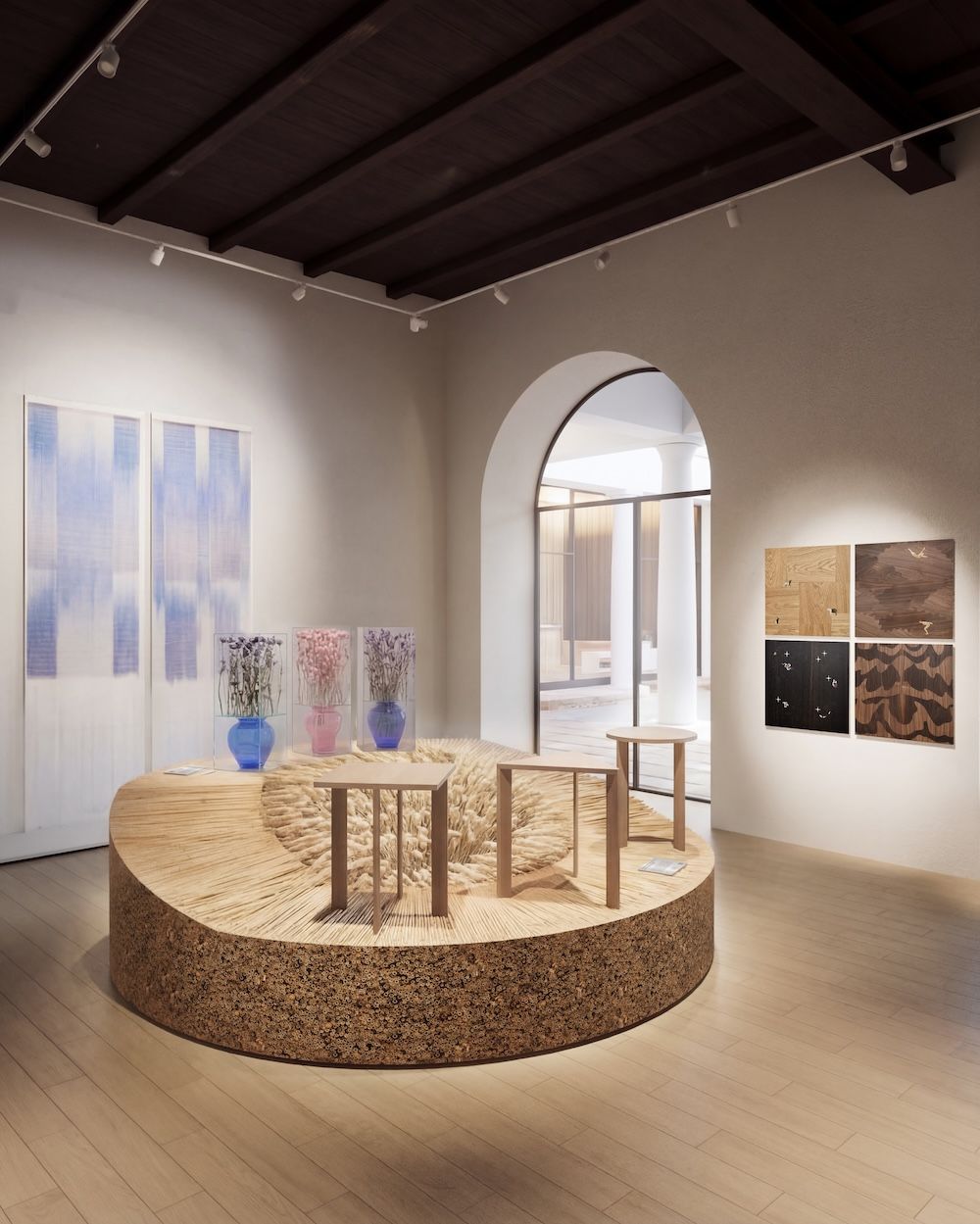 Exhibition detail showing spatial arrangement of artworks and installations