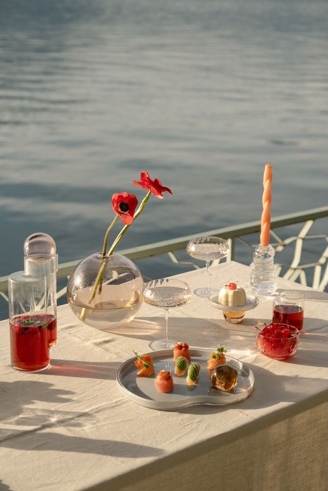 Tablescape by Nude Glass with a river view