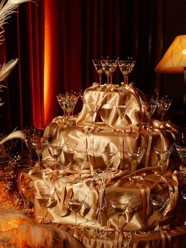 A martini tower and silk table cloth at NUDE Glass event