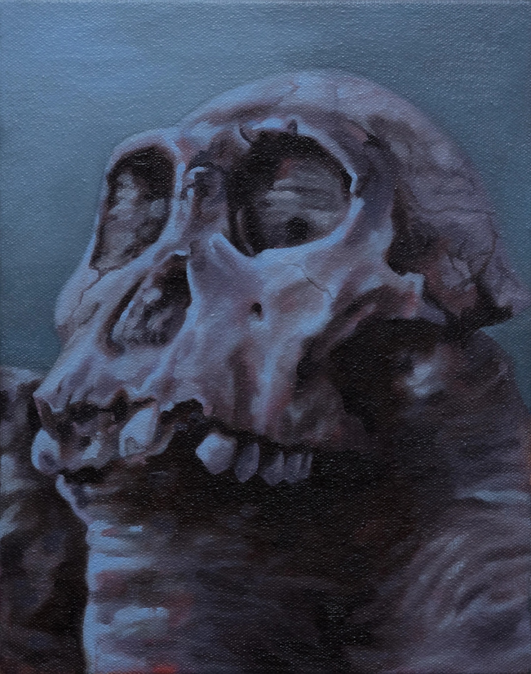 A painting of a greyish-purple skull atop a rock.
