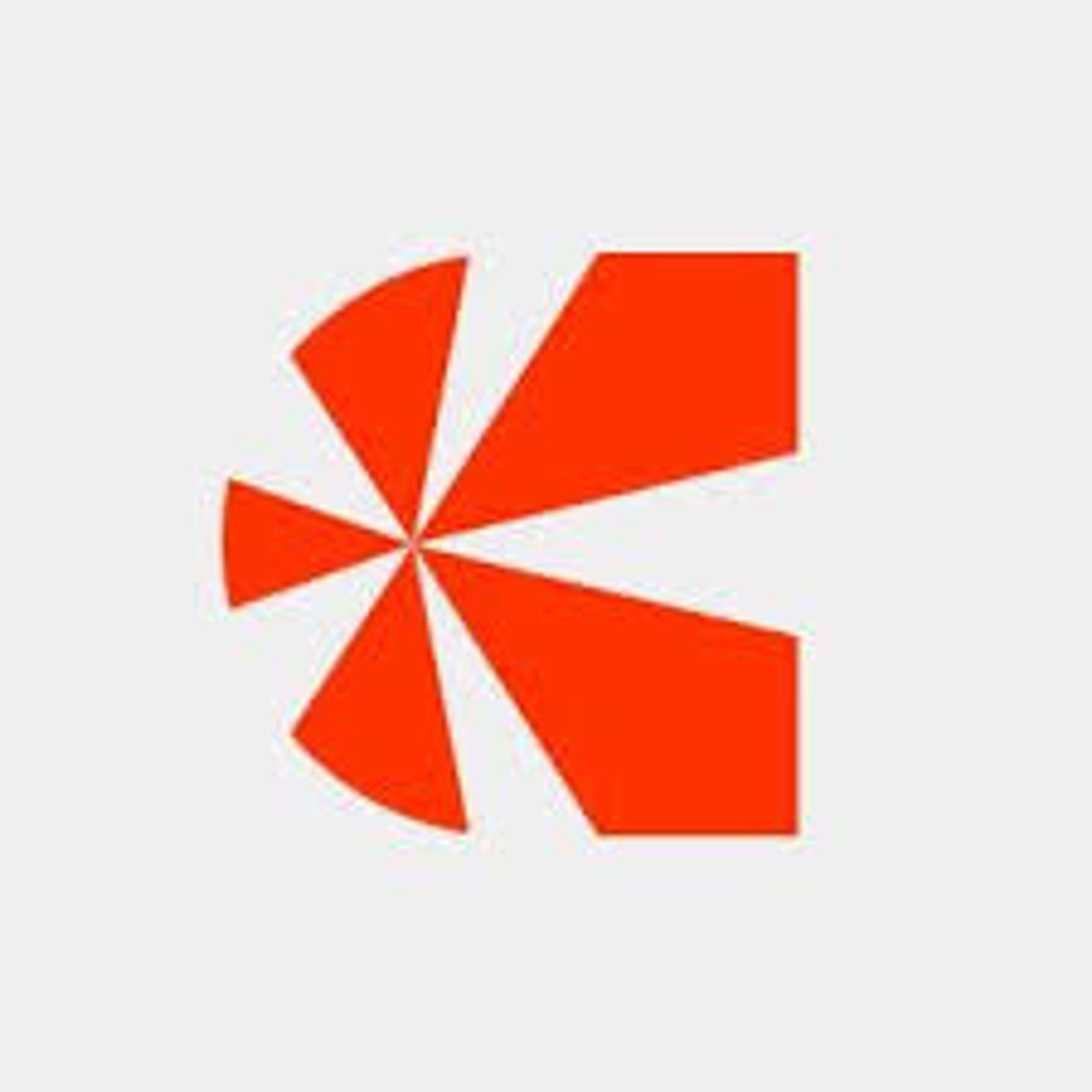 Orange geometric K logo.