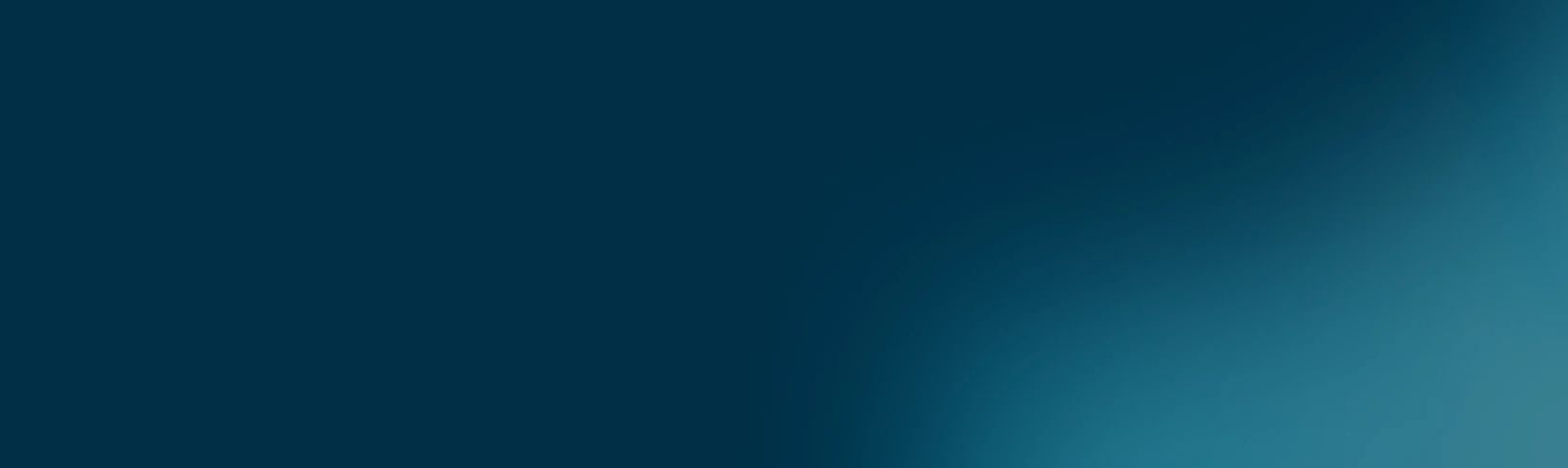 Horizontal gradient from dark blue to light teal.