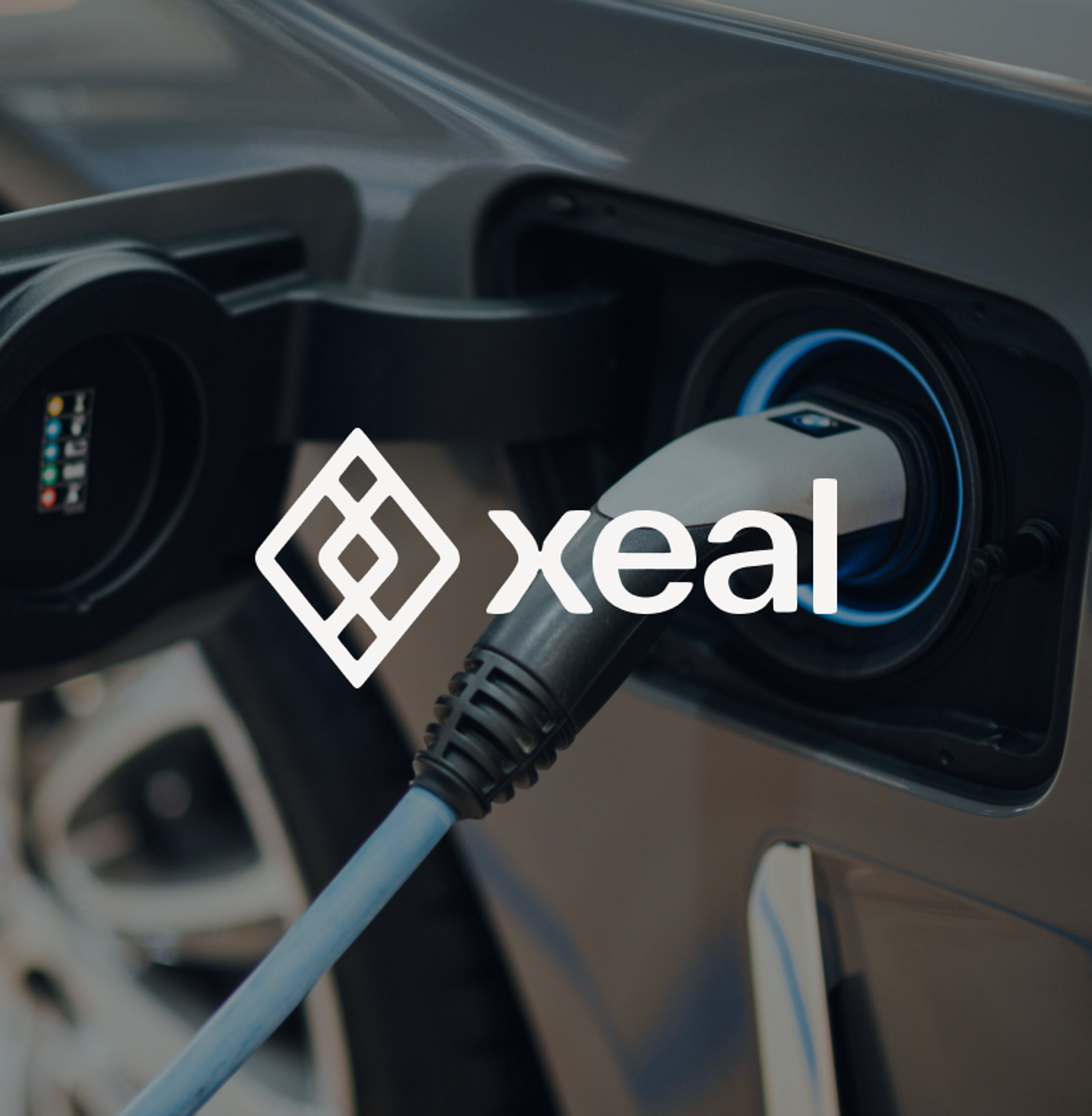 Xeal logo over an electric car charging with a blue glowing port.