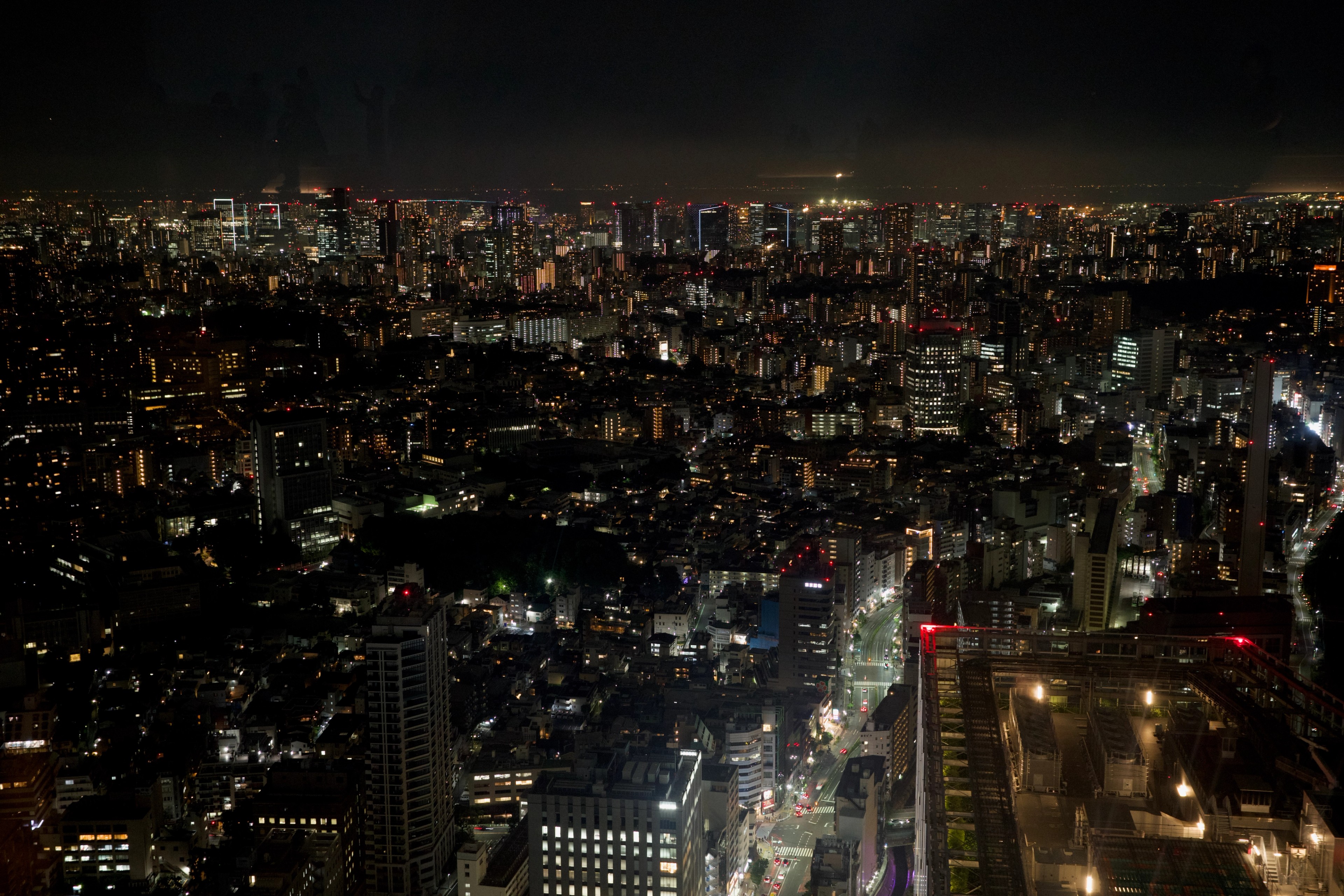 A broad nighttime view across the city.