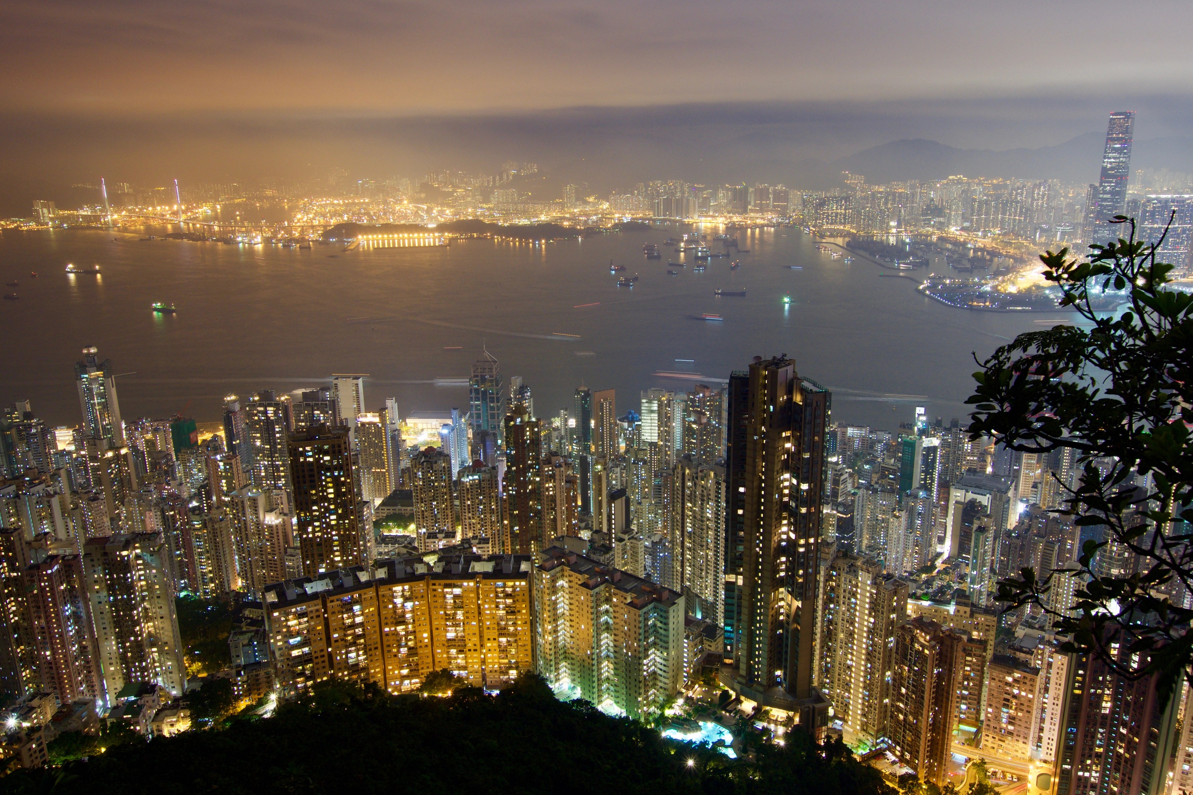 Nighttime Hong Kong skyline across the harbour.