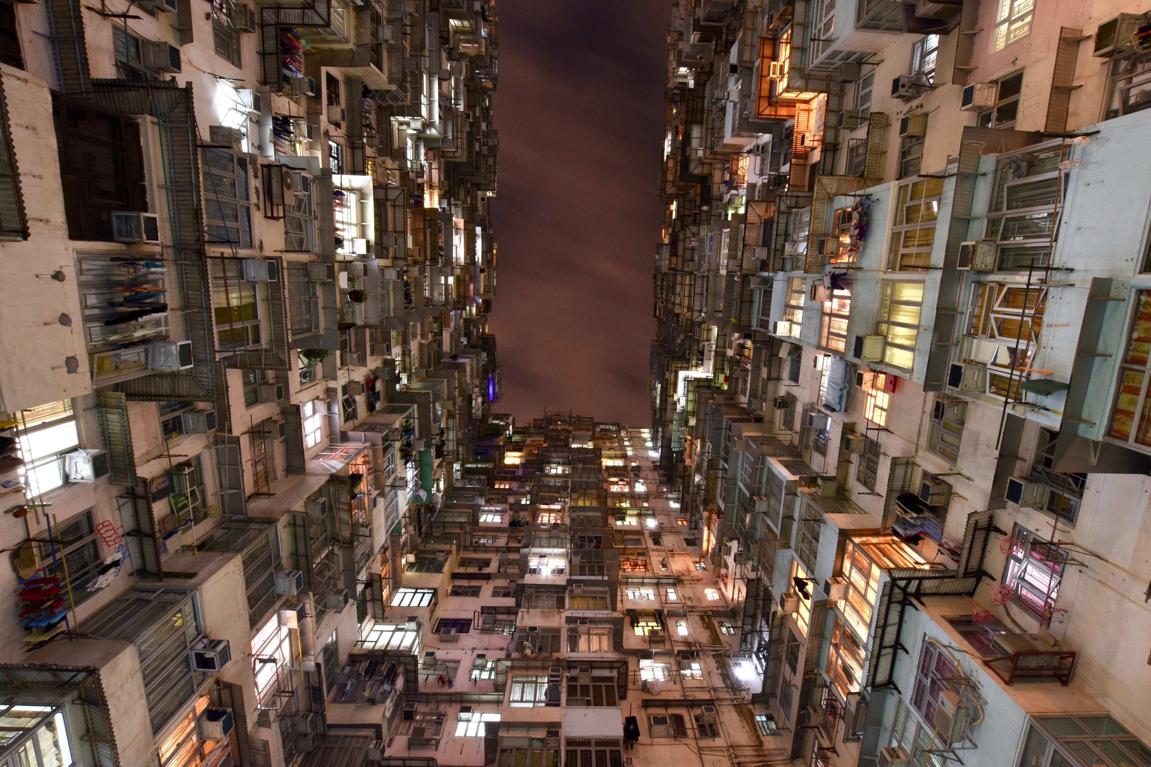 A top-down view into a tightly packed residential courtyard.