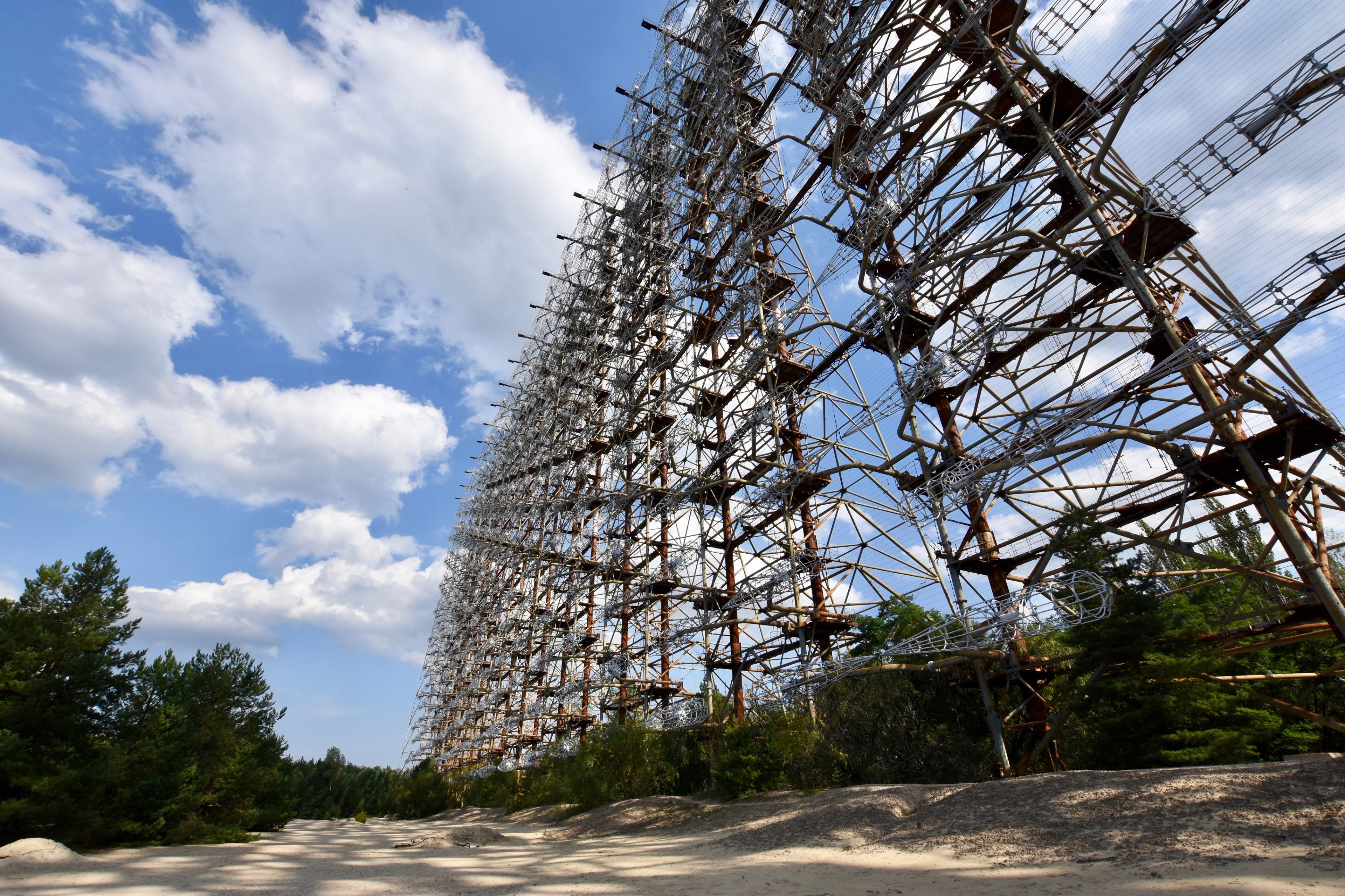 A close upward view of the Duga radar's metal framework.