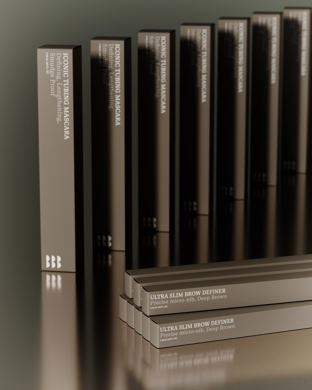 Iconic Tubing Mascara products, including Ultra Slim Brow Definer, are displayed in gray boxes with reflective surfaces.