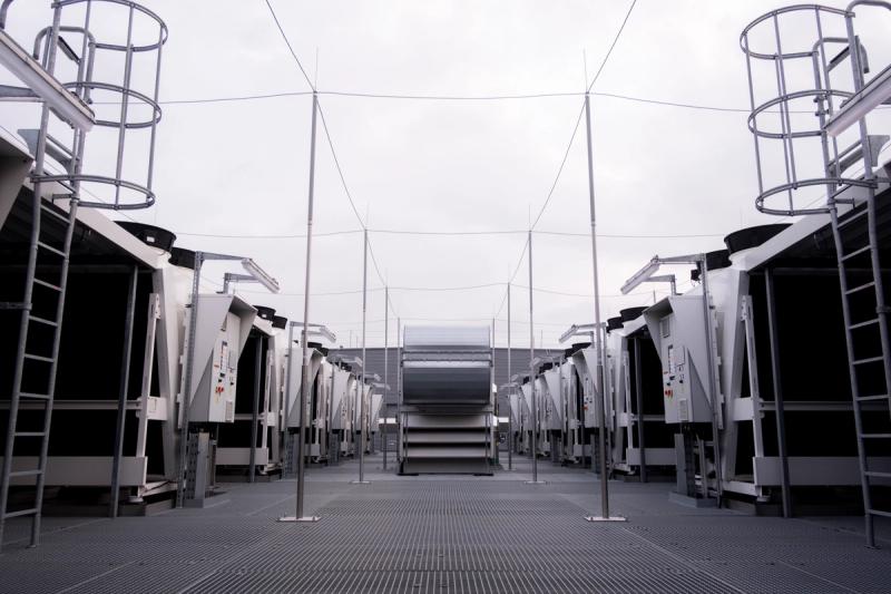 Row of cooling units on the rooftop of a data center