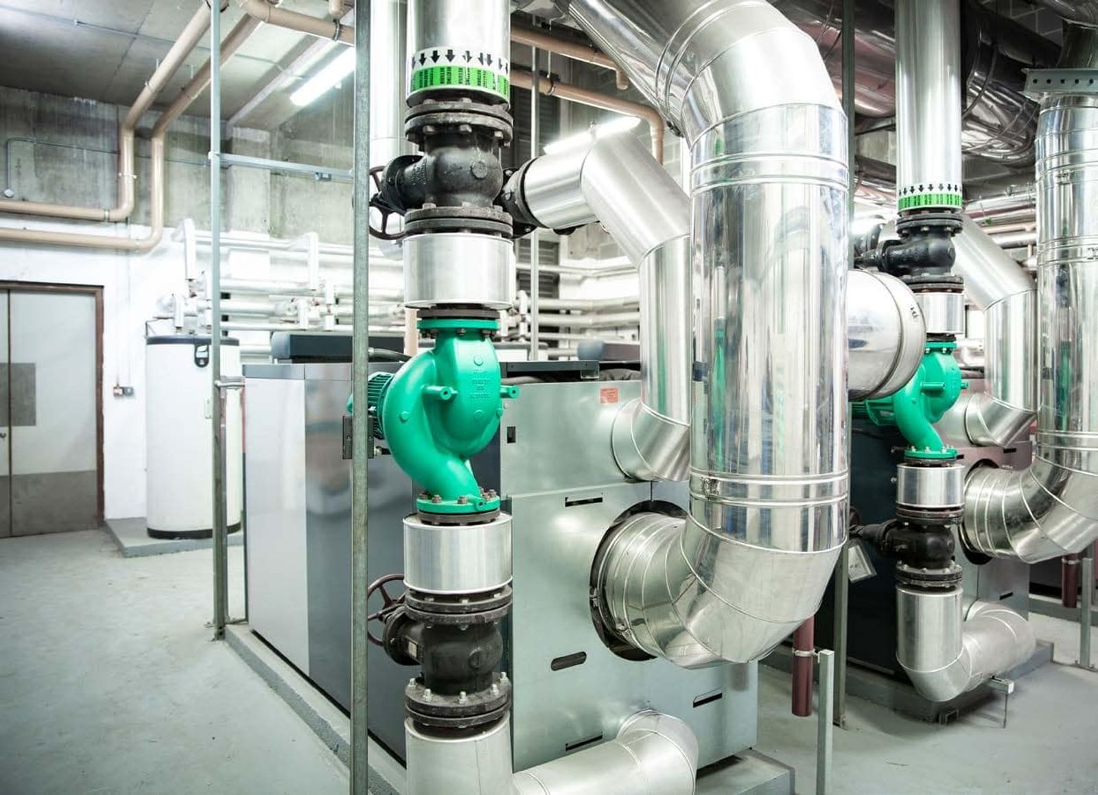 Wilo centrifugal pumps in plant room with pipe system for remote monitoring