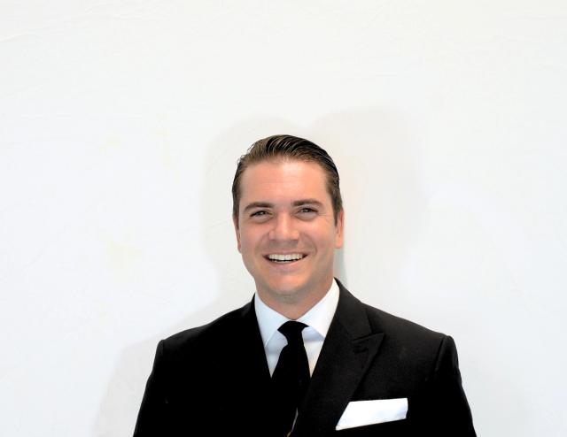 Portrait of Jesse Arthur, Chief Experience Officer at Exousia.