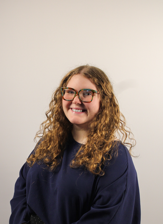Portrait of Jasmine Settle, Head of Grant Research at Exousia.
