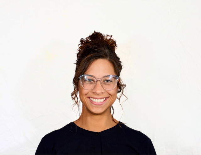Portrait of Chellsie Smith, Executive Director of Client Services at Exousia.