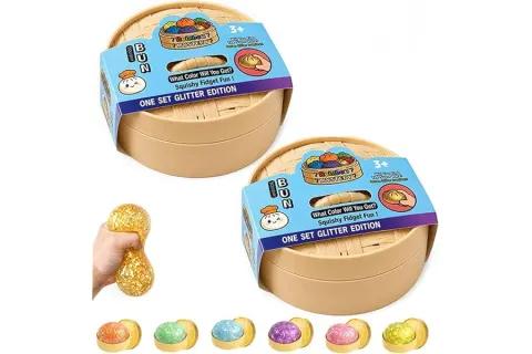 A two-piece dumpling mystery-box squishy toy observed on Amazon US