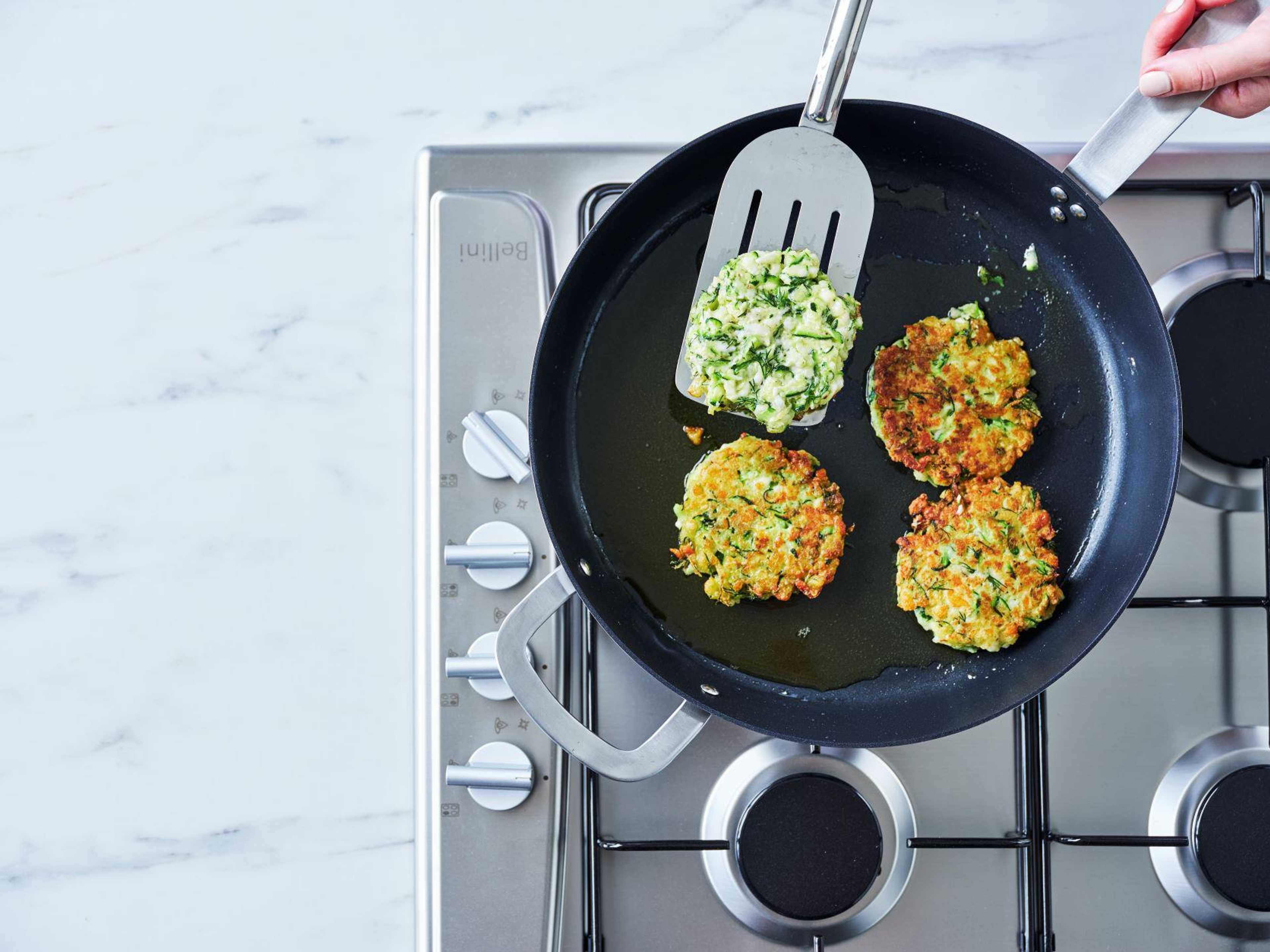 Zucchini And Halloumi Fritters With Smoked Salmon And Garlic Yoghurt