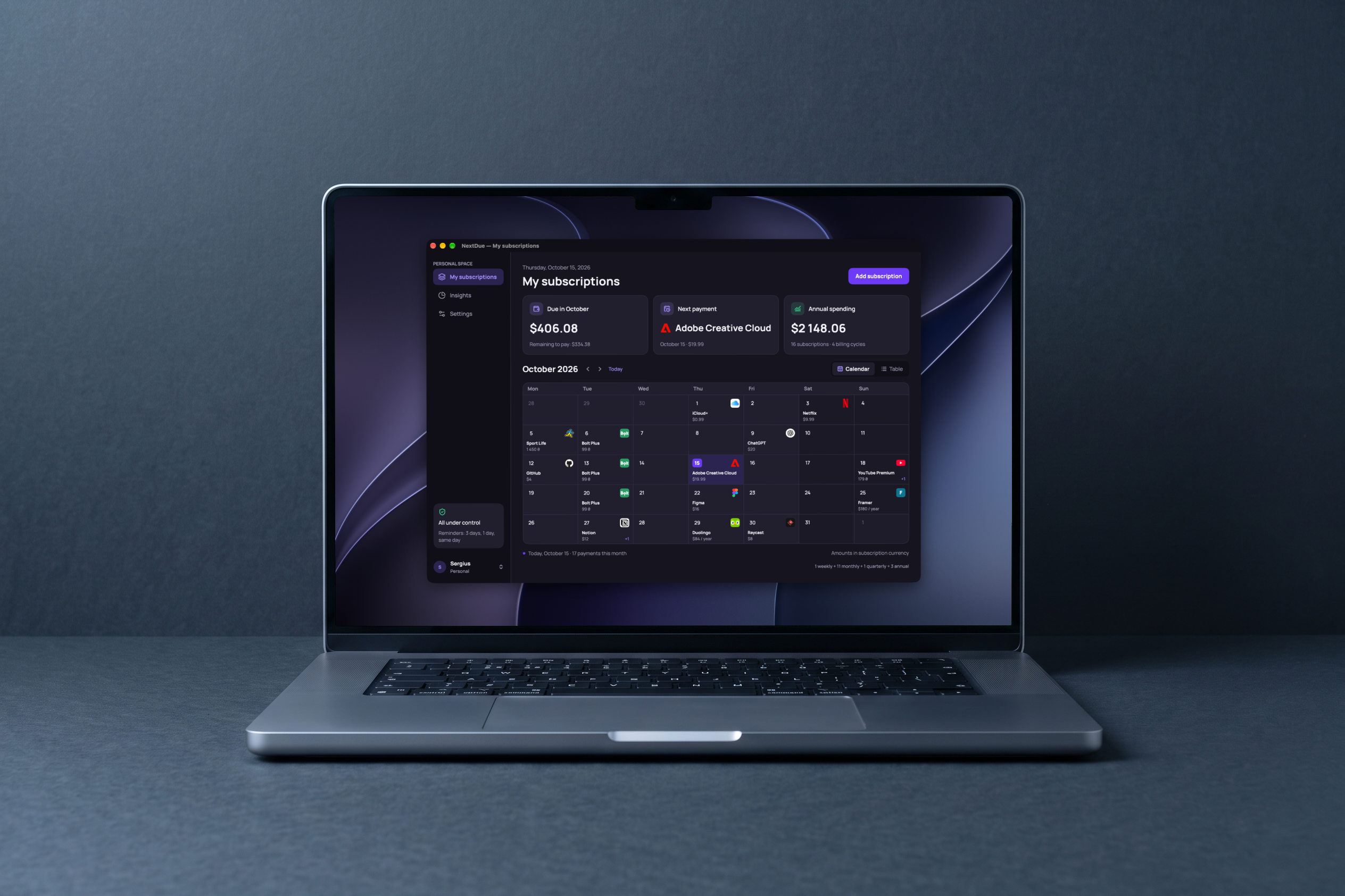 Laptop on dark slate showing the NextDue window on violet wallpaper: three cards on top and the October calendar with service logos on payment days