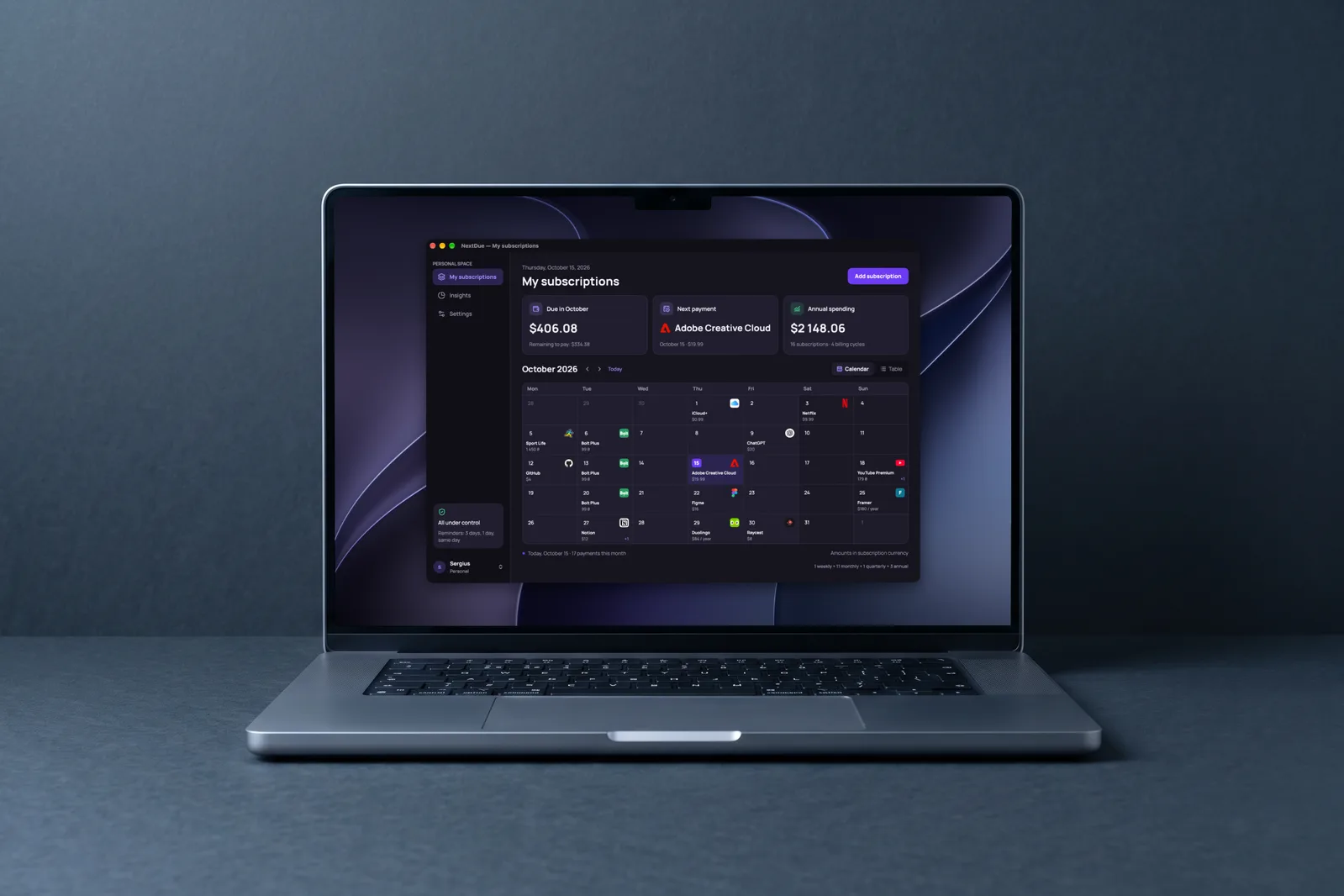 Laptop on dark slate showing the NextDue window on violet wallpaper: three cards on top and the October calendar with service logos on payment days