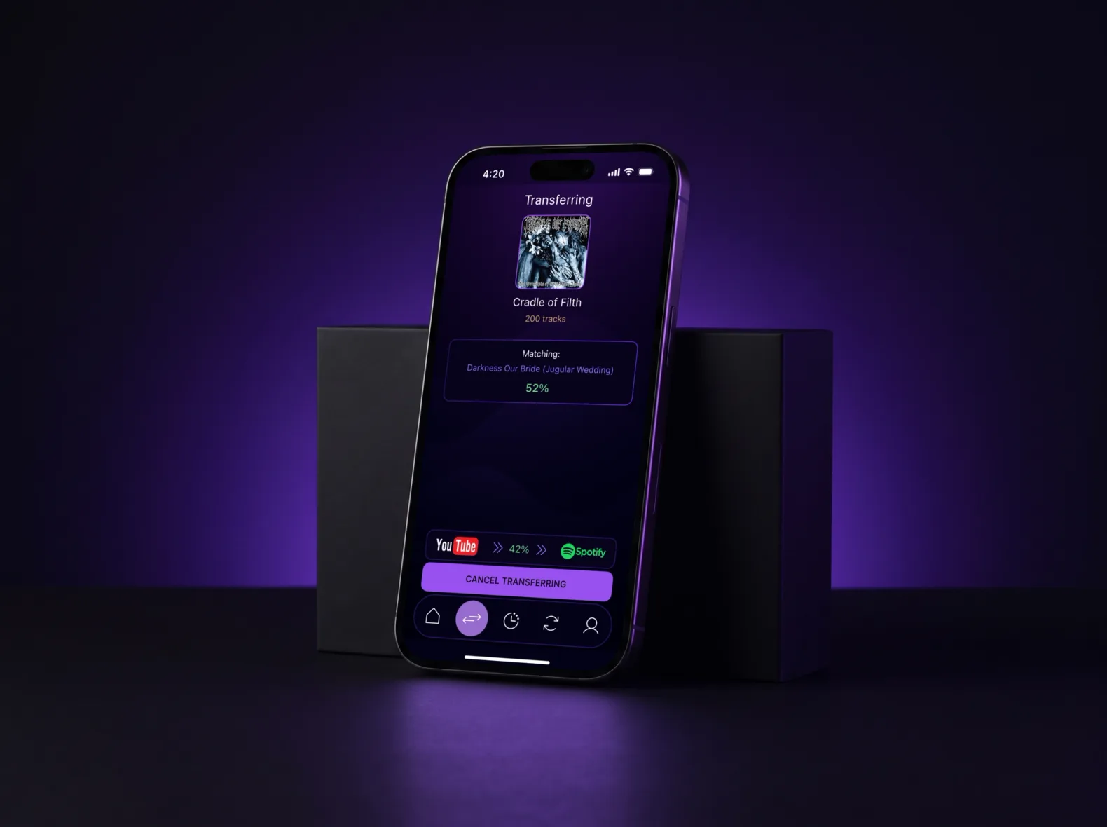 Phone leaning against a black block with a MusConv transfer from YouTube to Spotify: a 200-track album, the current track name and 52%