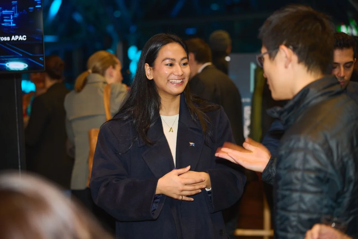 Aisshwarya Kansakaar talking with guests at Tech Week Singapore