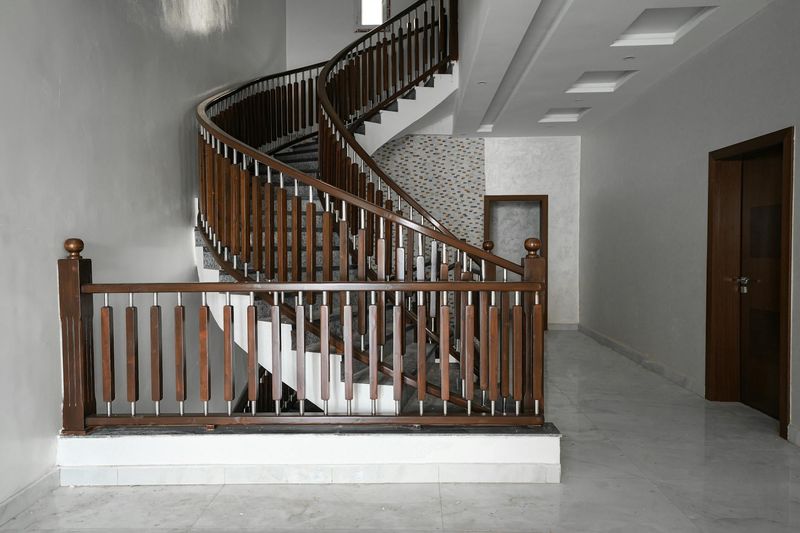 Custom entryway with modern staircase in Miami
