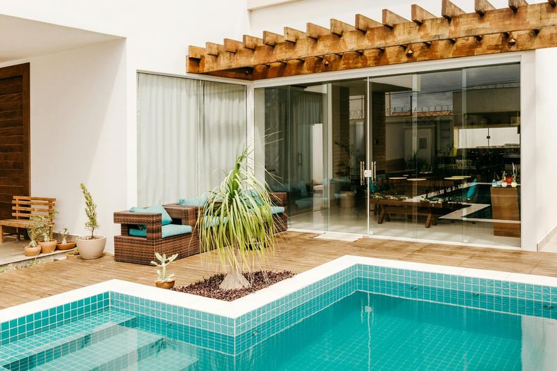Outdoor living space with pool and covered patio