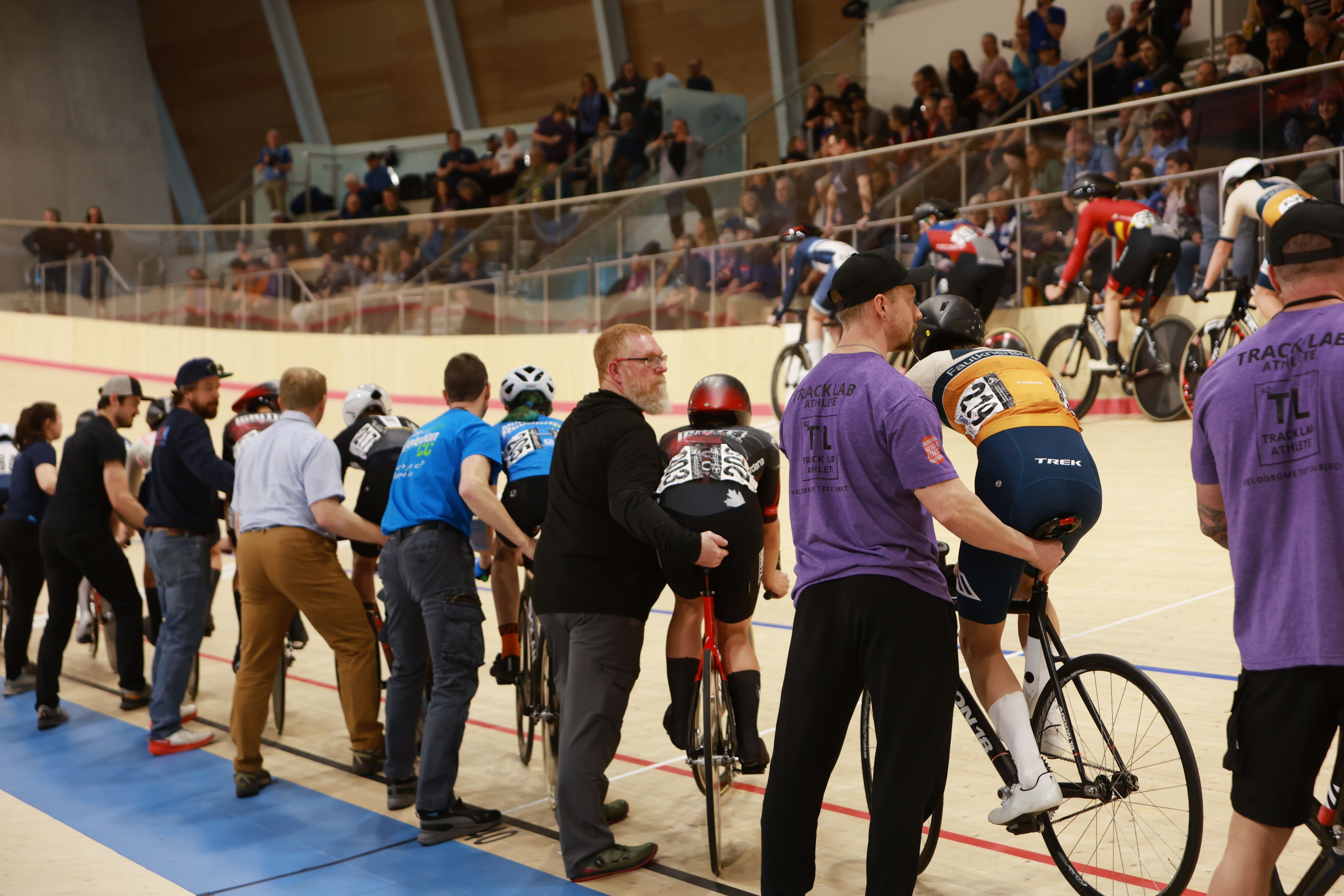 Spectators, coaches and riders gather at the rail during the 2026 Junior Nationals