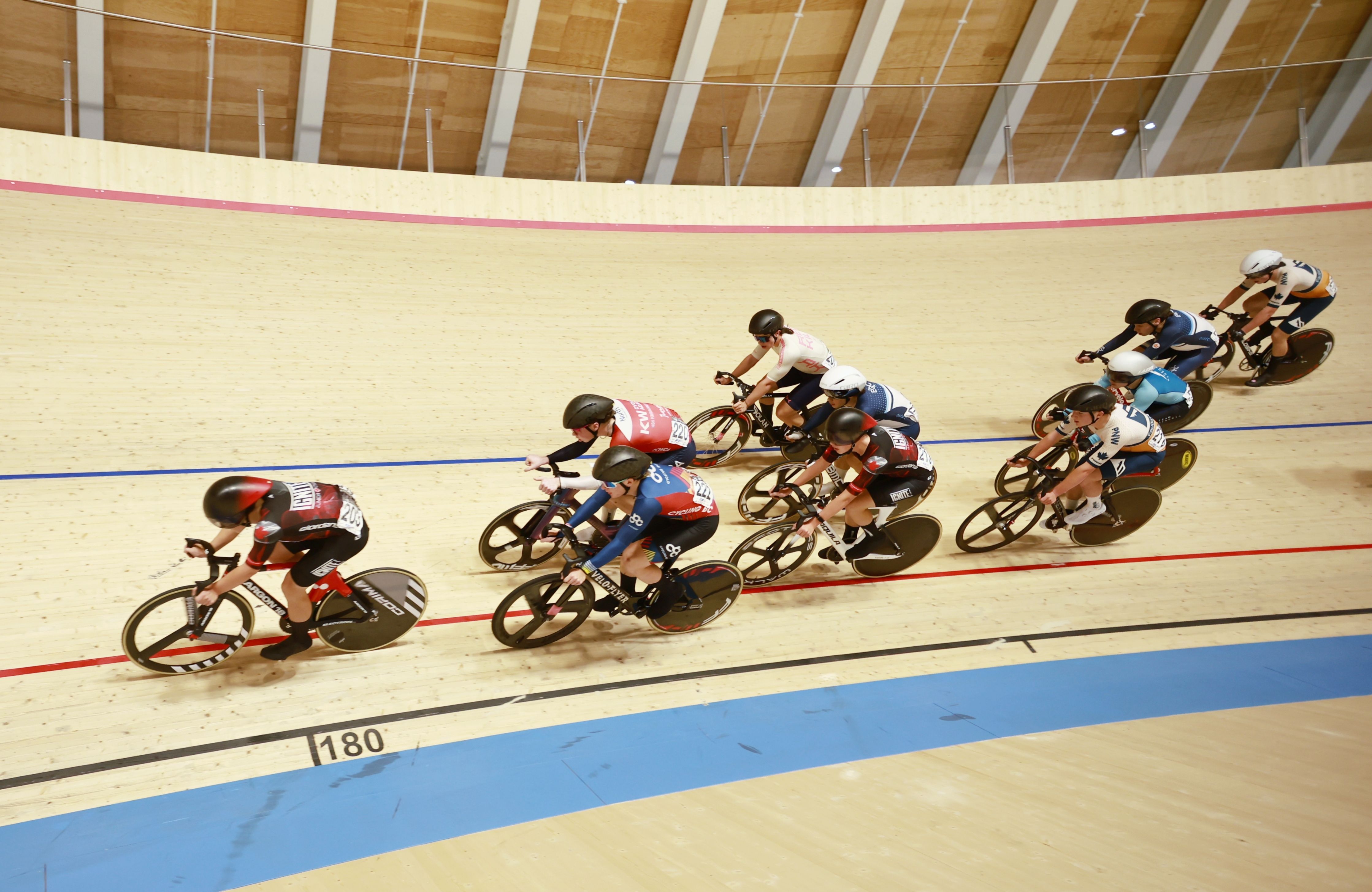 A bunch races along the banking