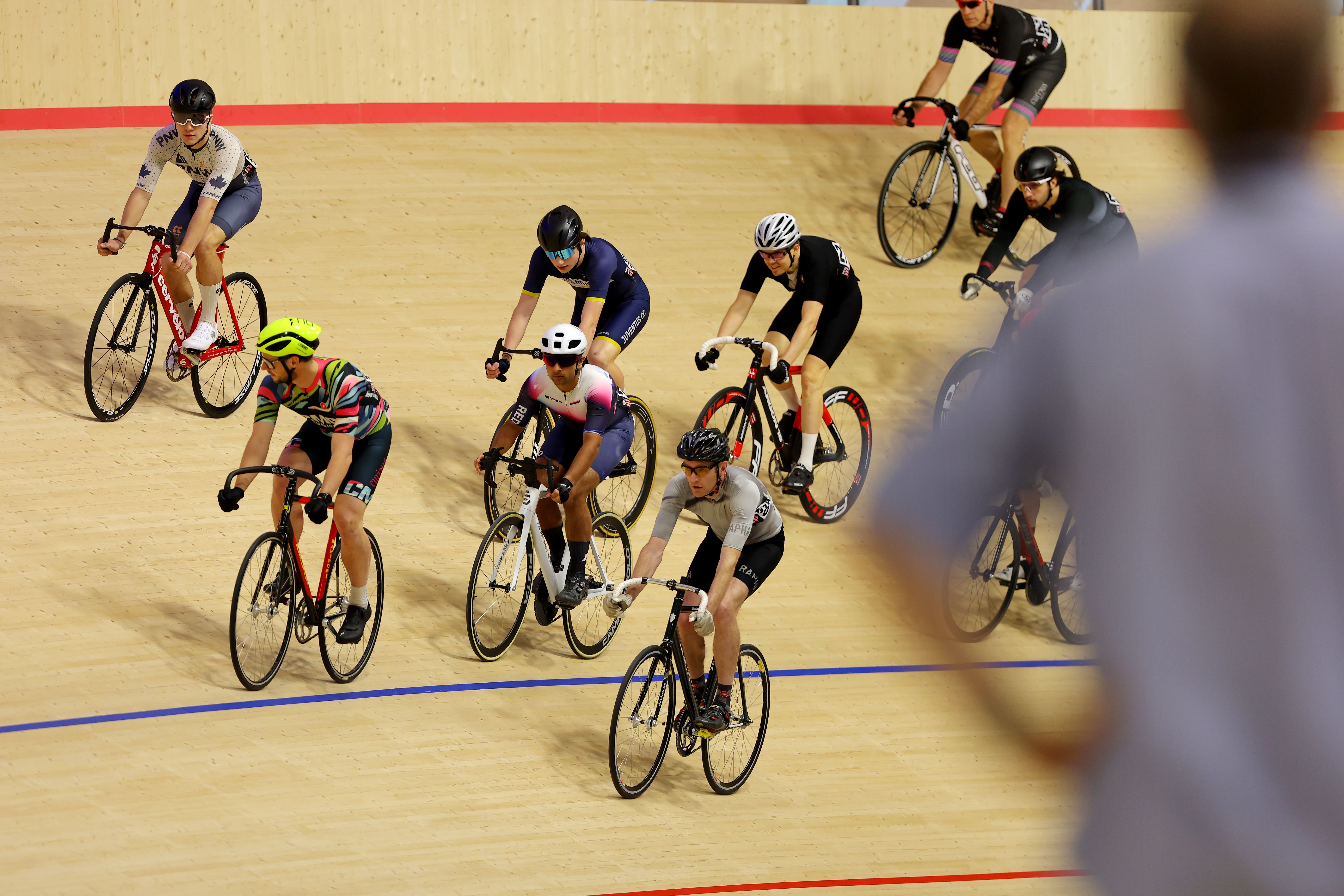 A group of riders riding together on the boards during a session