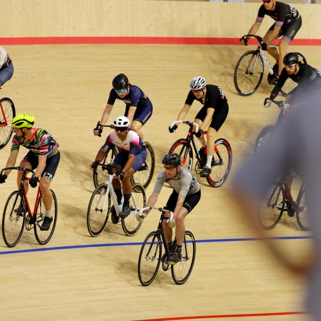 A group of riders riding together on the boards during a session