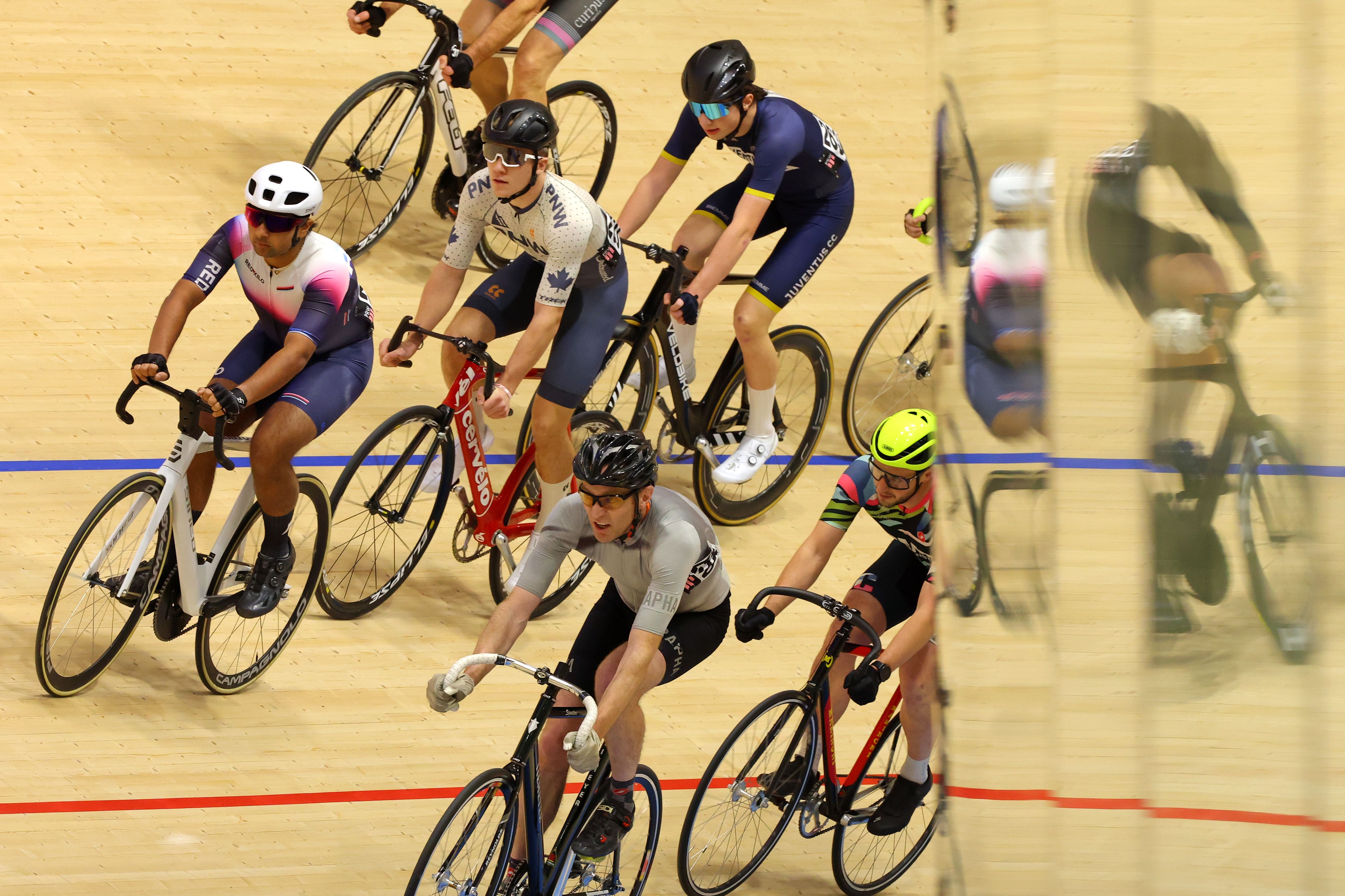 Adult riders racing in a bunch