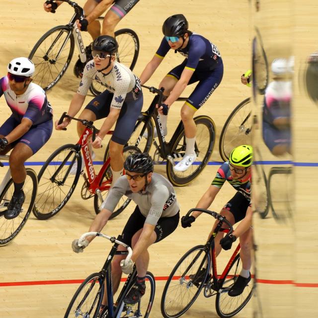 Adult riders racing in a bunch