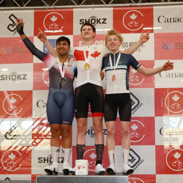 Medallists celebrate on the podium