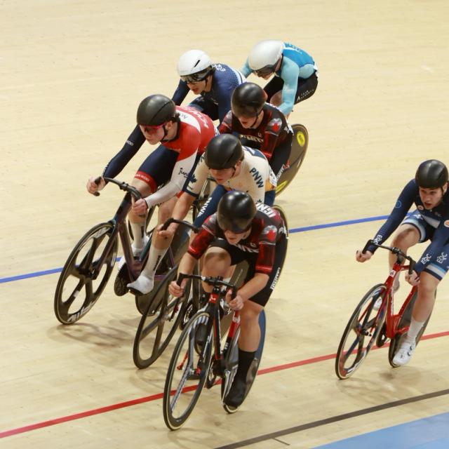 Sprinters dive down the banking mid-race