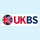 UKBS logo with a circular Union Jack emblem, red 'UK', and blue 'BS' text.