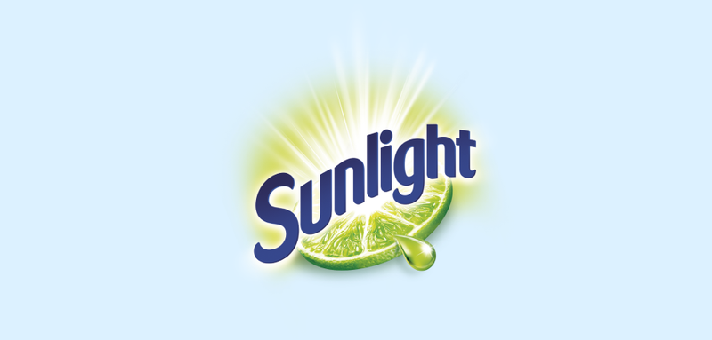 a sunlight logo with a slice of lime and a drop of liquid