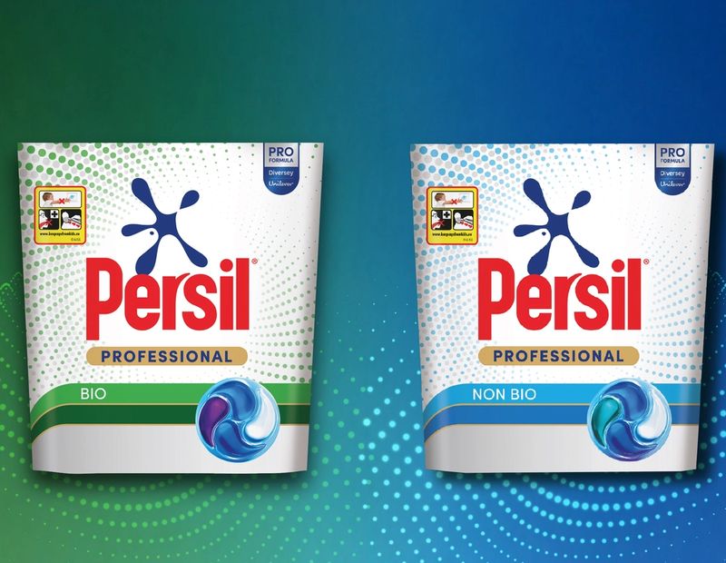 Two Persil Professional laundry detergent packages, one green 'Bio' and one blue 'Non Bio'.