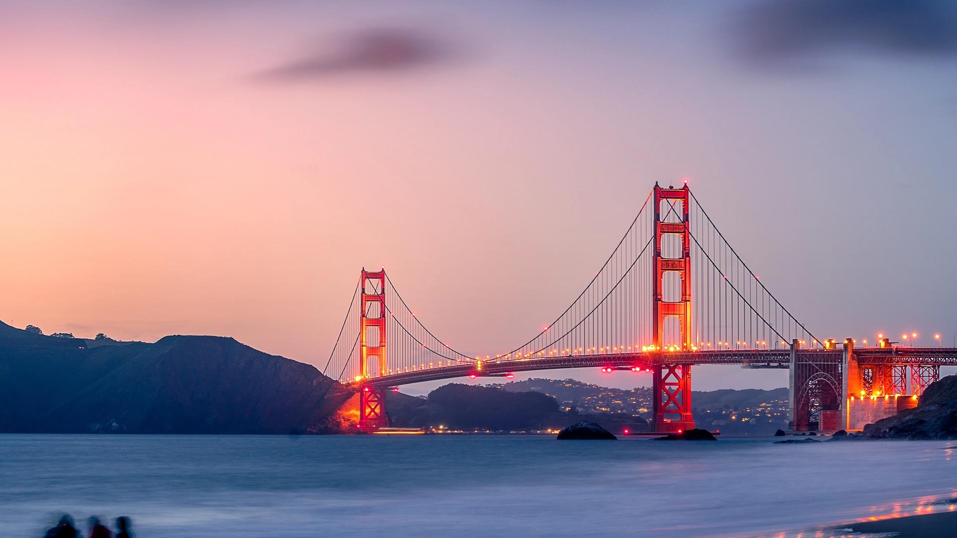 Golden Gate bridge against pink and magenta sunset