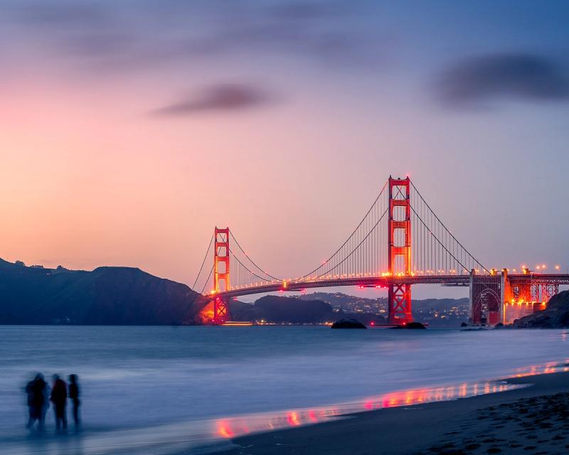 Golden Gate bridge against pink and magenta sunset