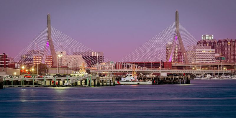 Zakim Bridge from Chelsea at morning with pink skies inthe background