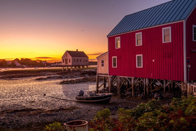 Cape Porpoise shack in Maine at sunrise against golden skies