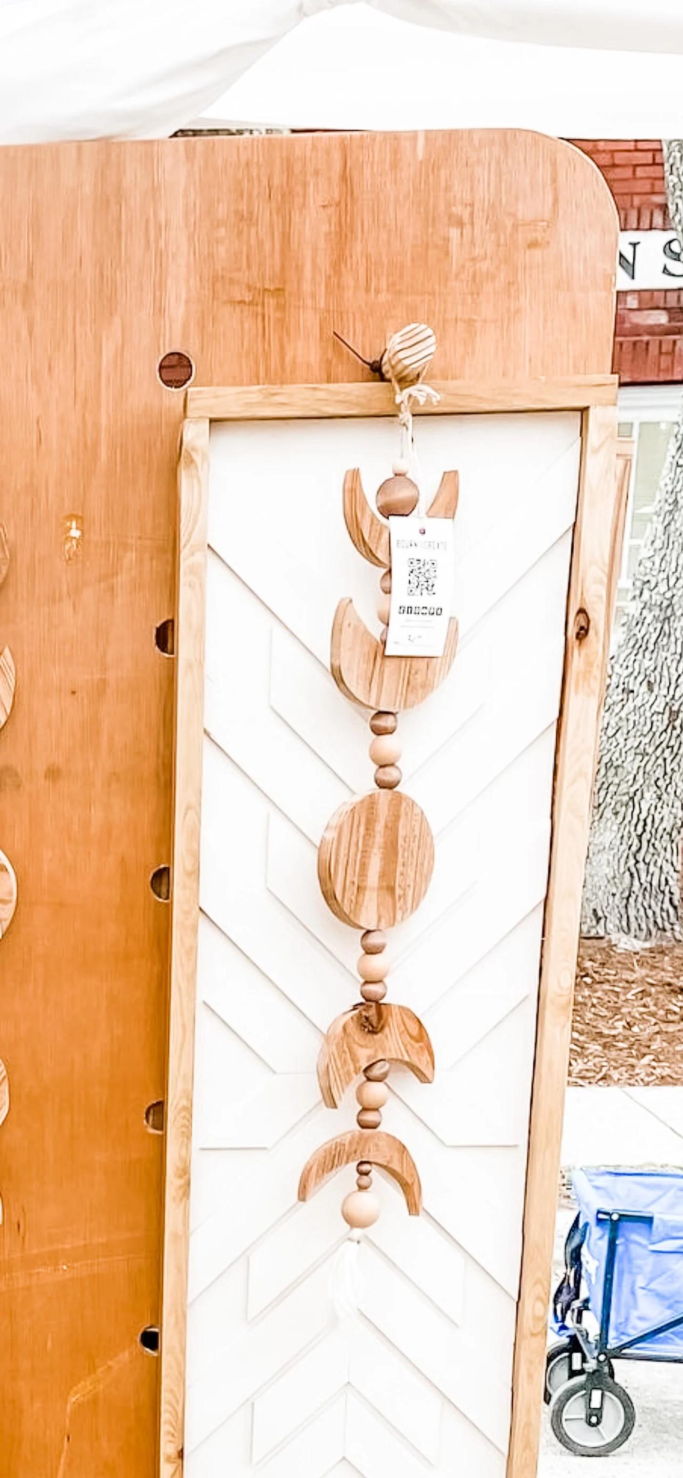 Detail of the hanging sign and dowel display