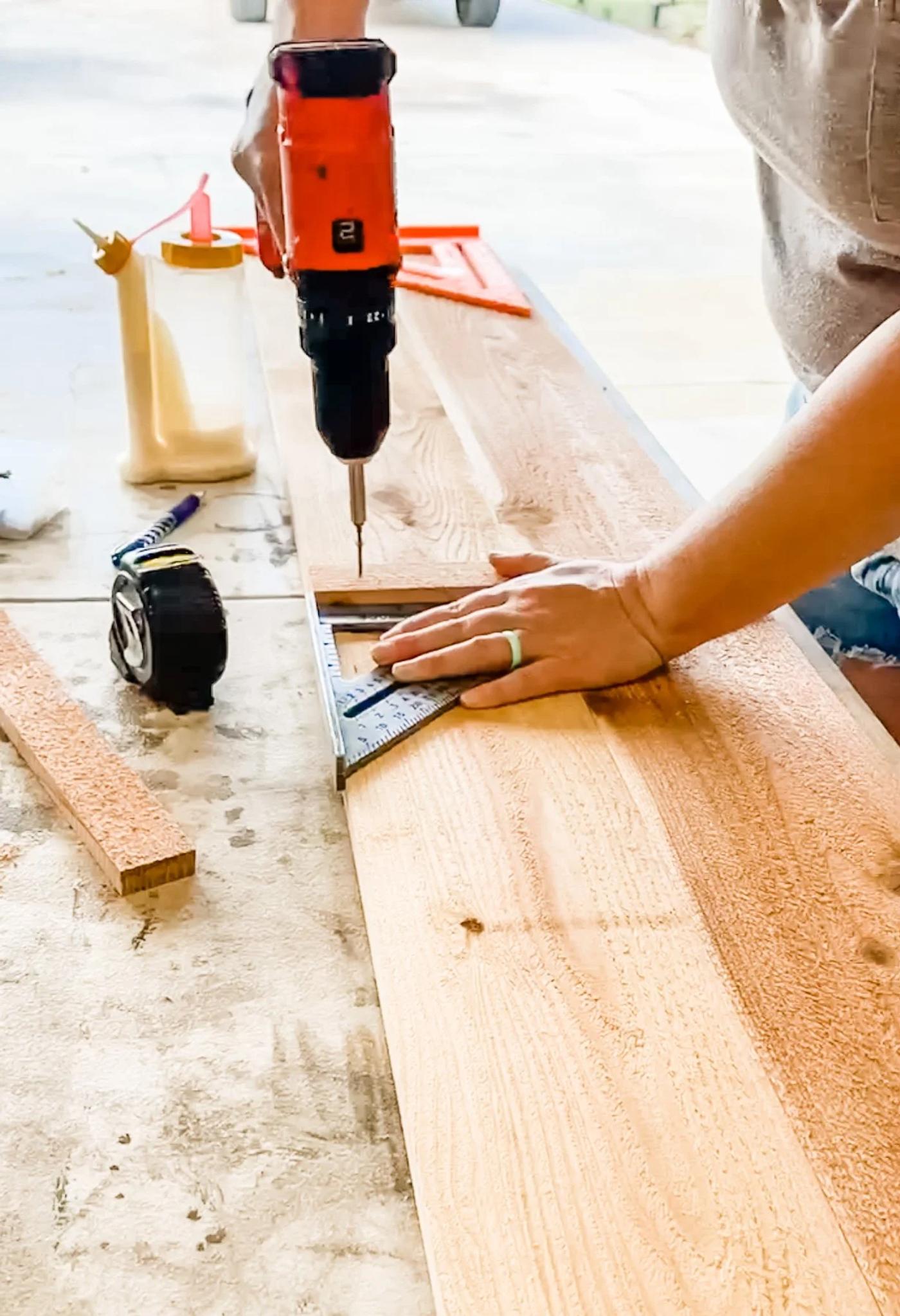 Attaching the corner supports with a square to keep everything aligned