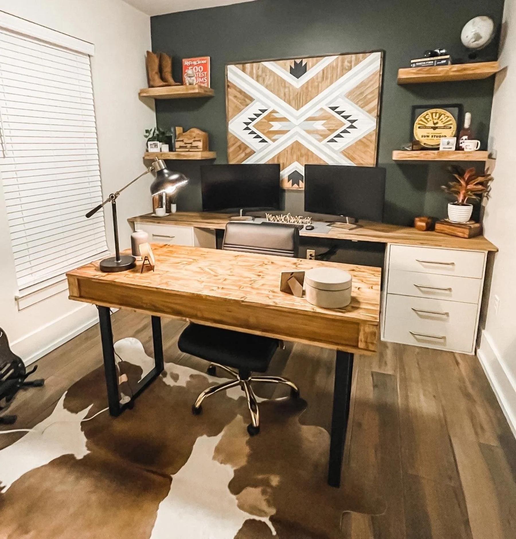 A handmade wood writing desk with open storage cubbies in a home office