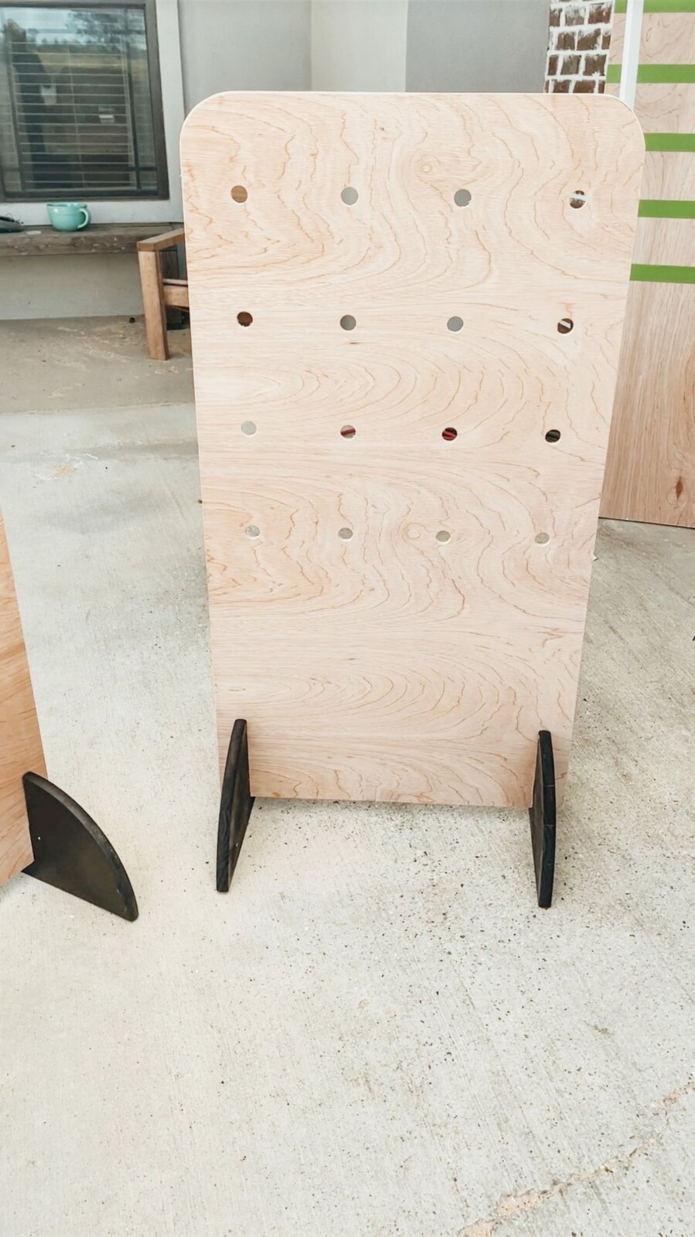 Dowels in the stand-alone panel, ready to hold the goods