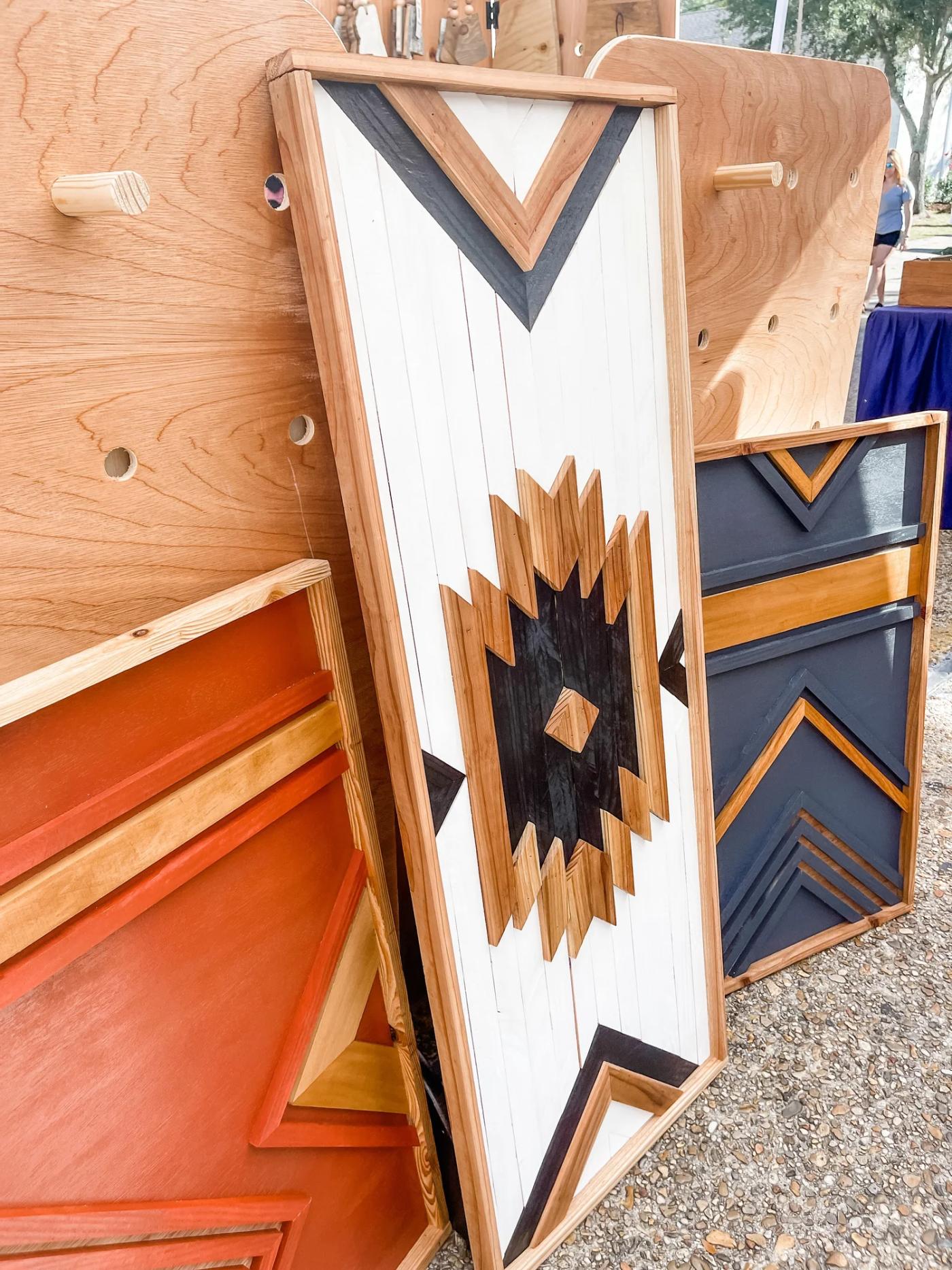 The finished panels displaying my wood art at the festival